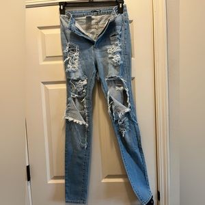 Fashion nova pretty ripped jeans… size 11/30 never worn new with tags.